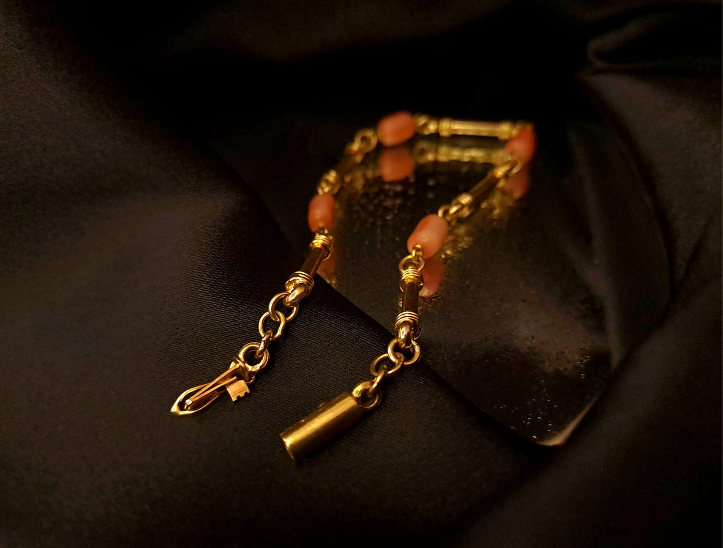 Pulseira caninhas e pedras coral Ourivesaria Carlos Alberto