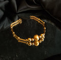 Pulseira tipo caninhas e bolas Ourivesaria Carlos Alberto