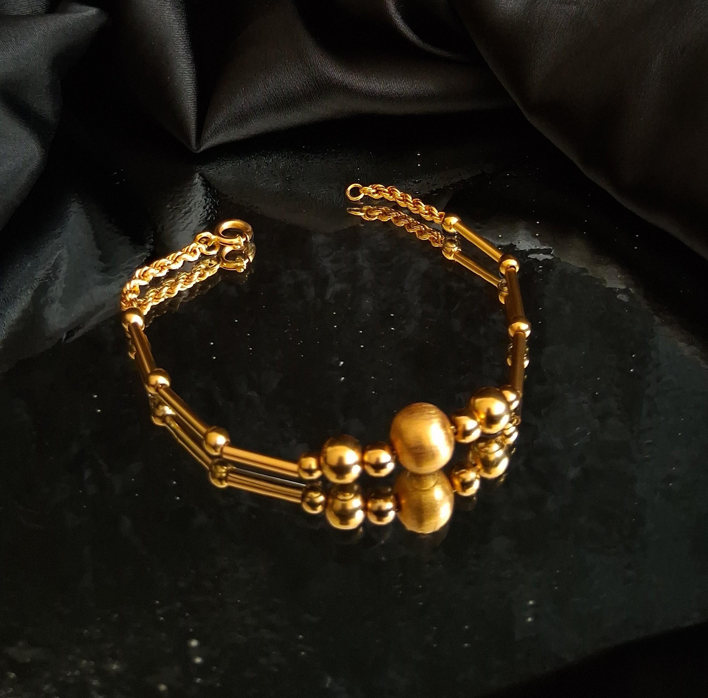 Pulseira tipo caninhas e bolas Ourivesaria Carlos Alberto
