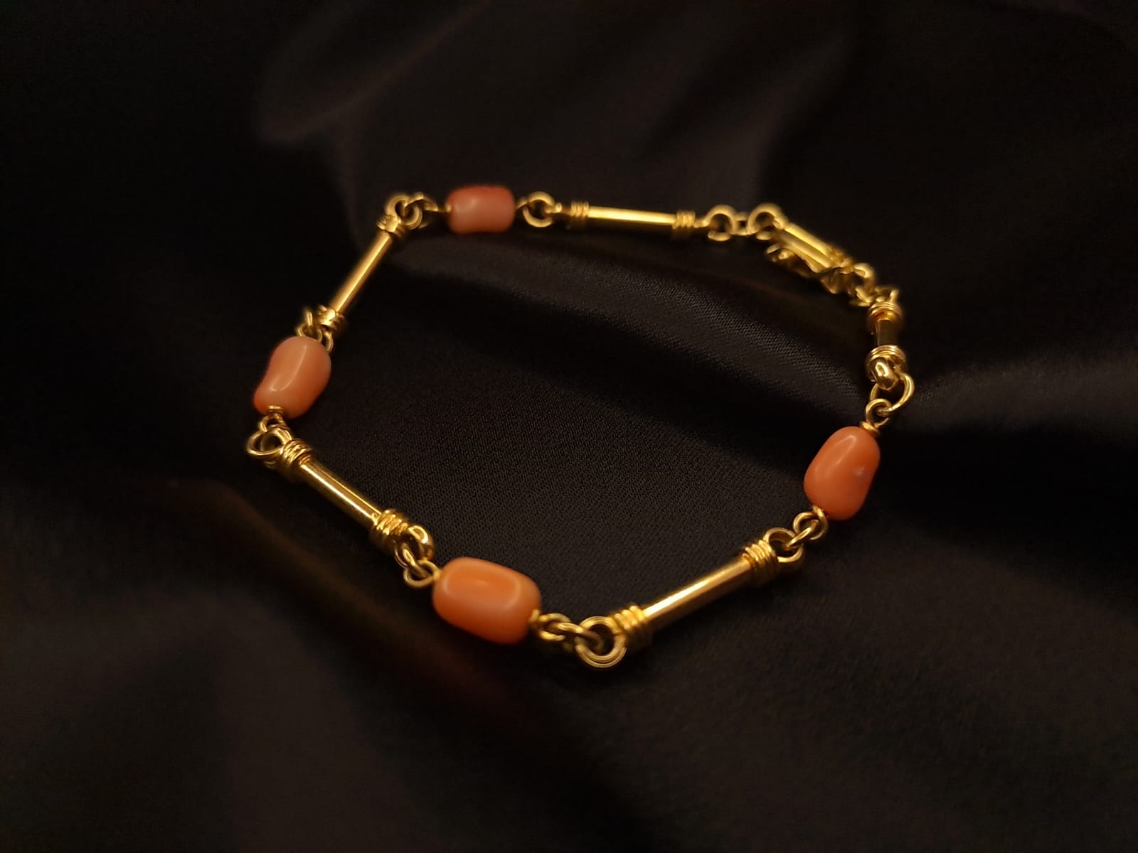 Pulseira caninhas e pedras coral Ourivesaria Carlos Alberto