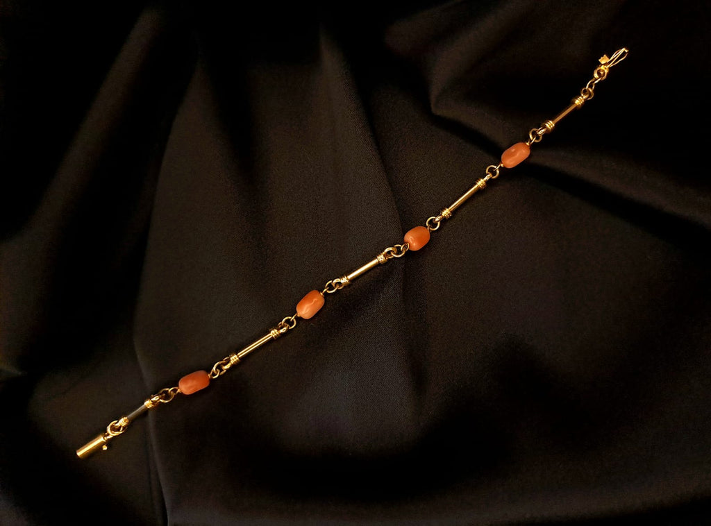 Pulseira caninhas e pedras coral Ourivesaria Carlos Alberto