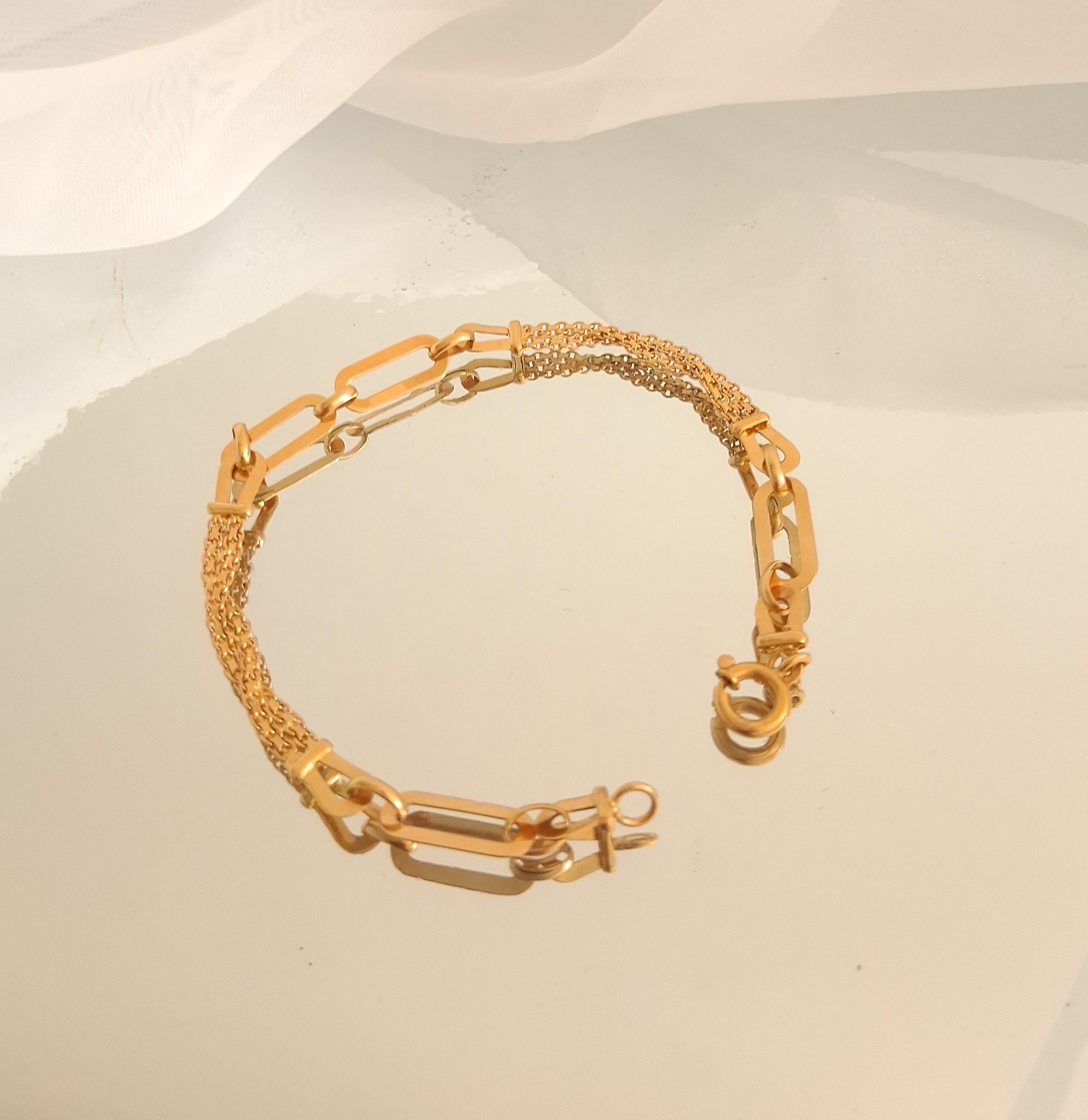 Pulseira elos e fio entrançado , em ouro Ourivesaria Carlos Alberto